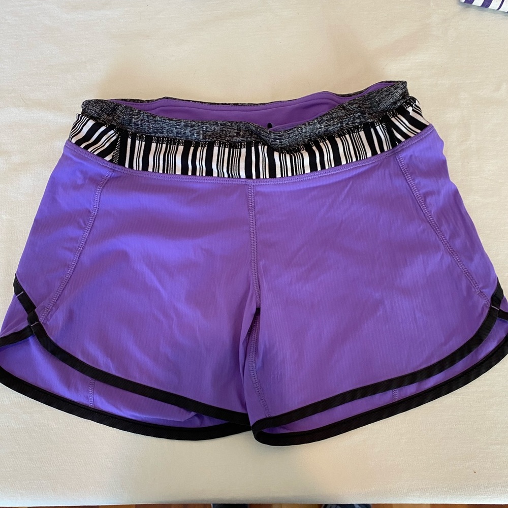 Purple Ivivva relay racer long shorts